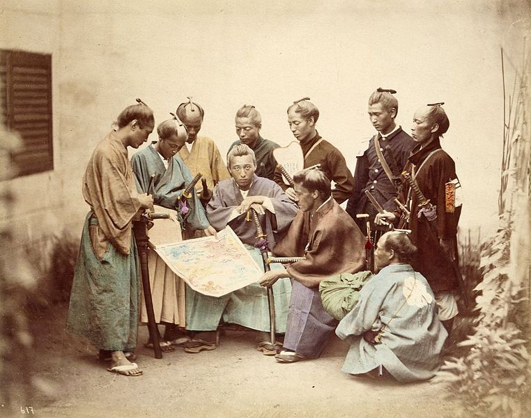 Some samurai are wearing traditional attires whereas others wear western uniforms. All have katanas and are checking a map